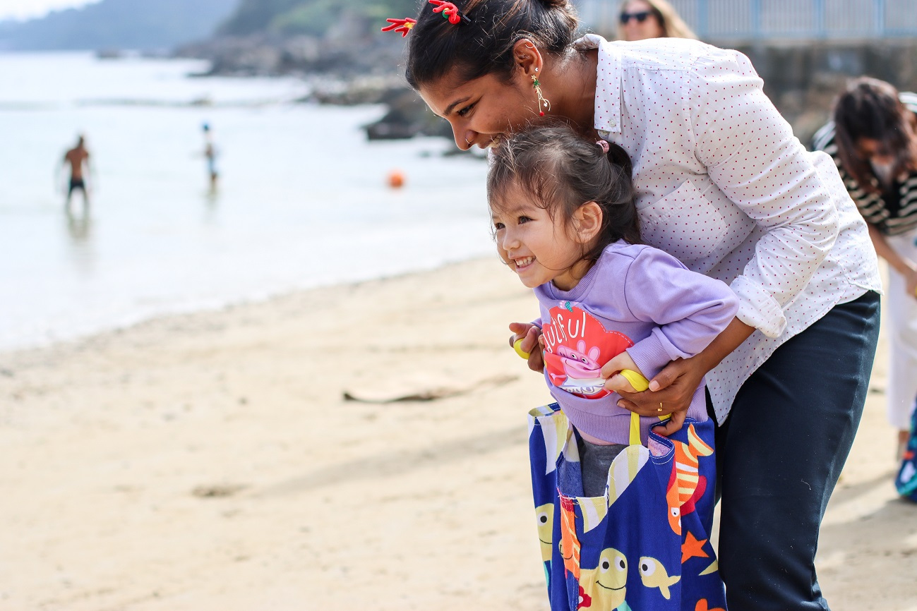 CLB beach day parent with child